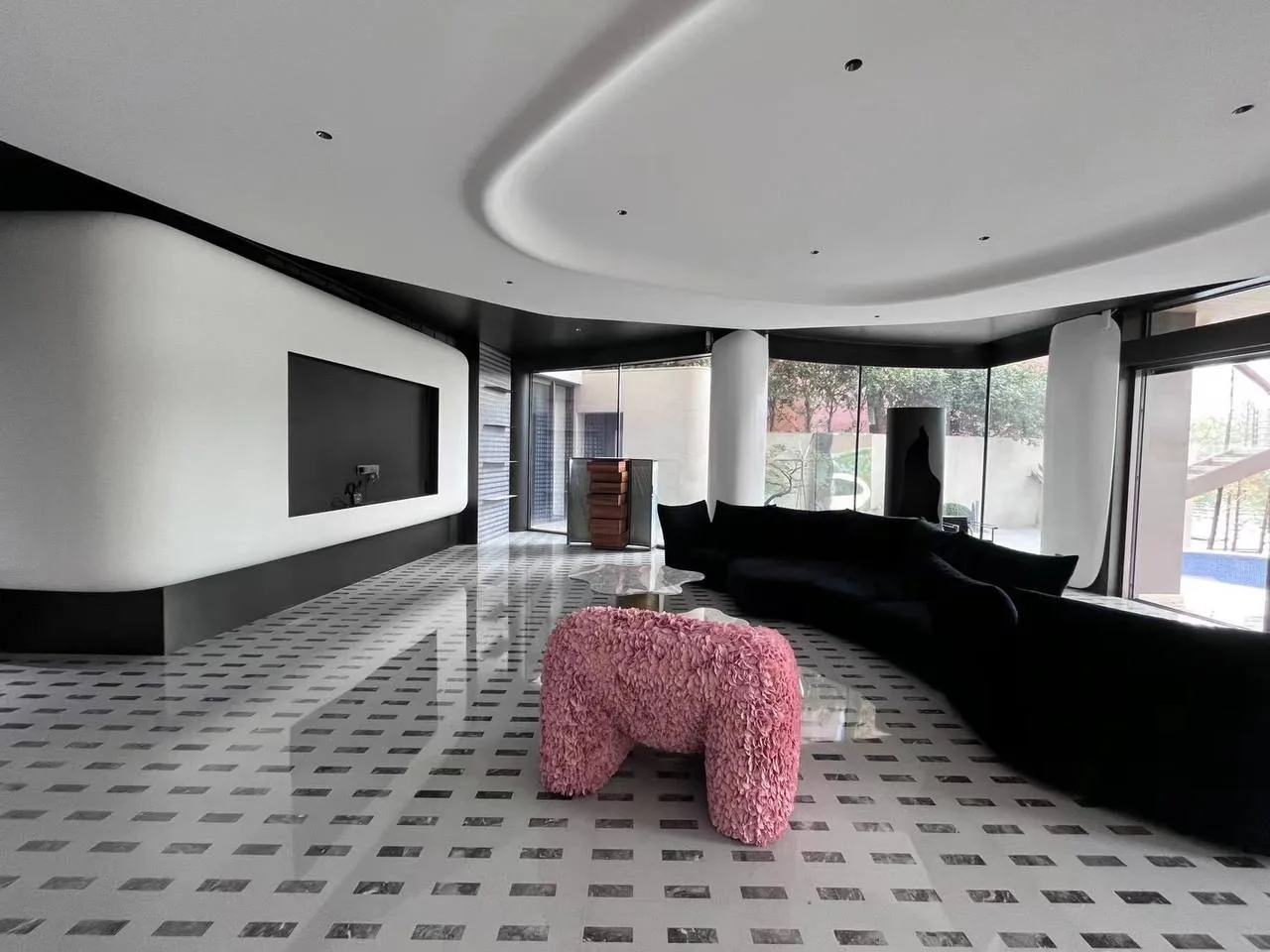 Landed home living room with a custom feature wall by Takumi