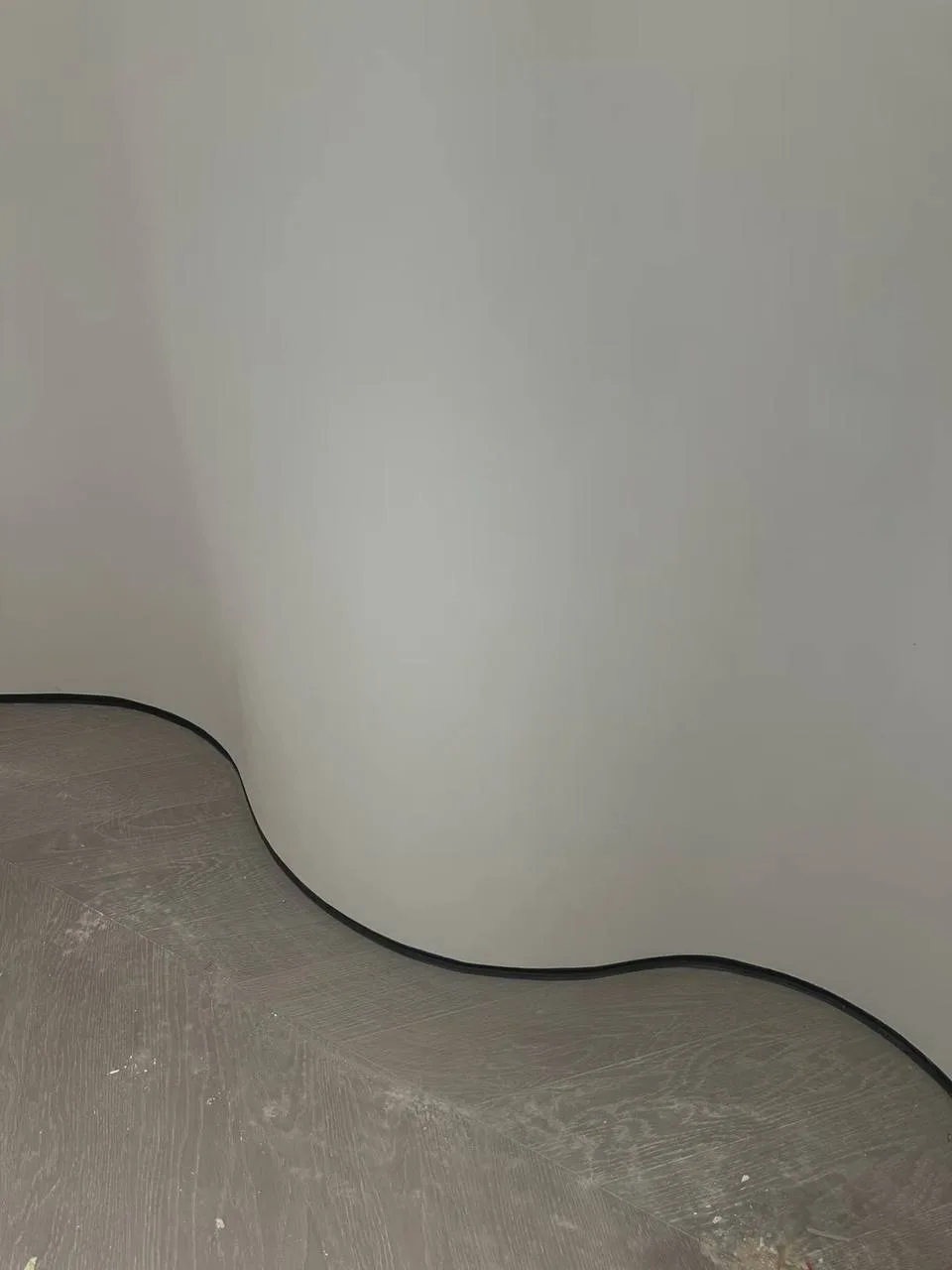 Curved feature wall built by a Singapore carpenter