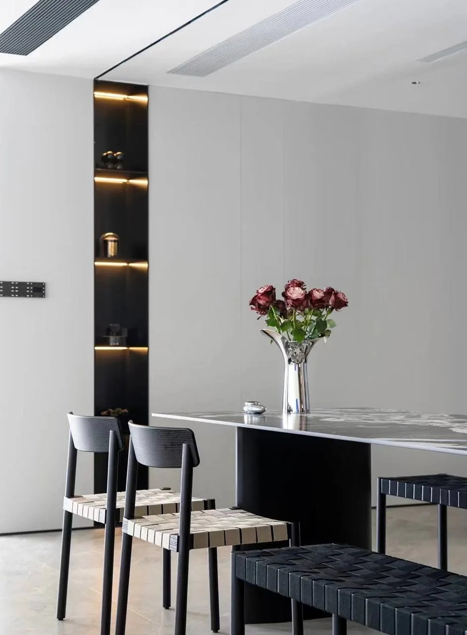 Dining area with backlit display niche
