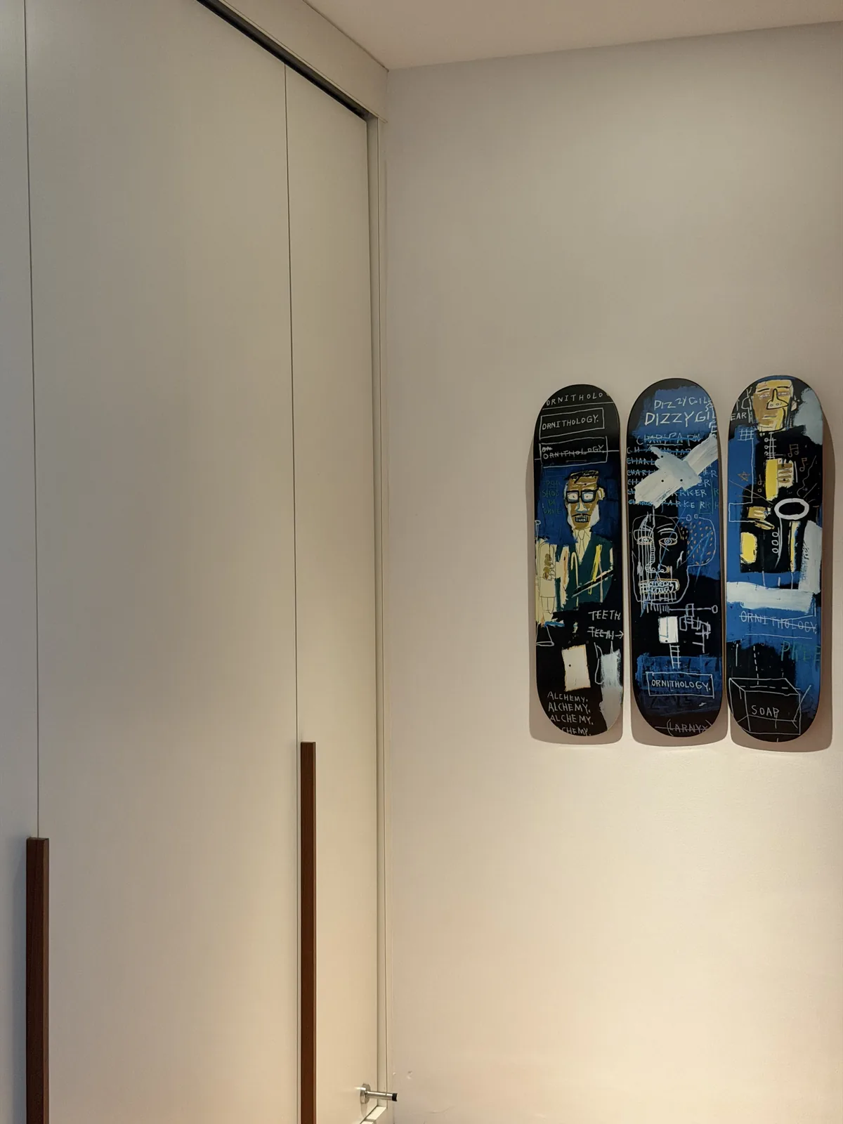Flush full-height wardrobe cabinetry with handleless doors, Singapore