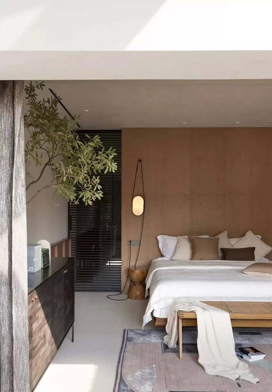 Japandi bedroom with panelled timber feature wall