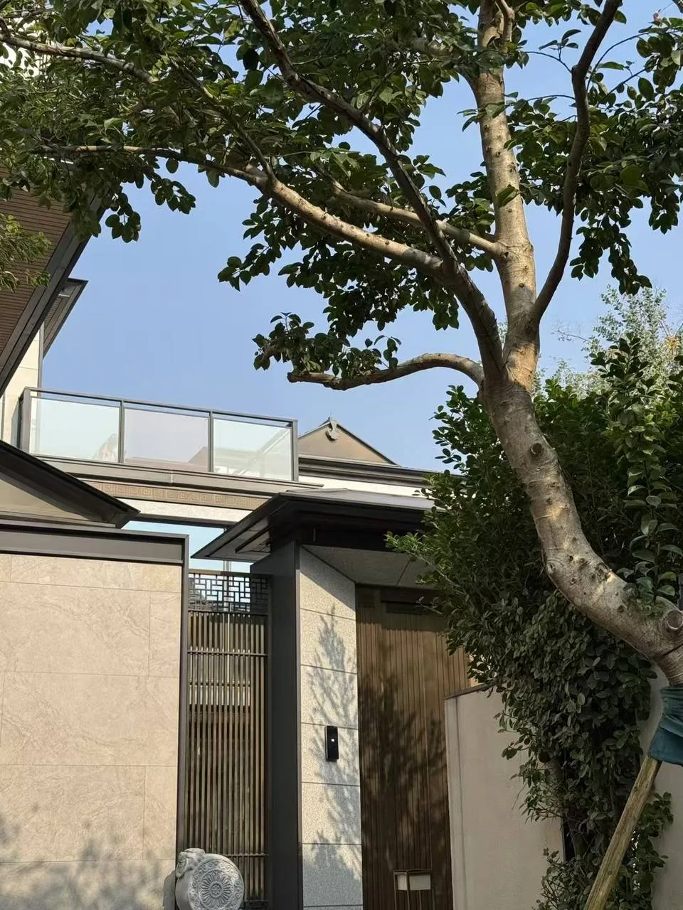 Landed home exterior with timber screen gate