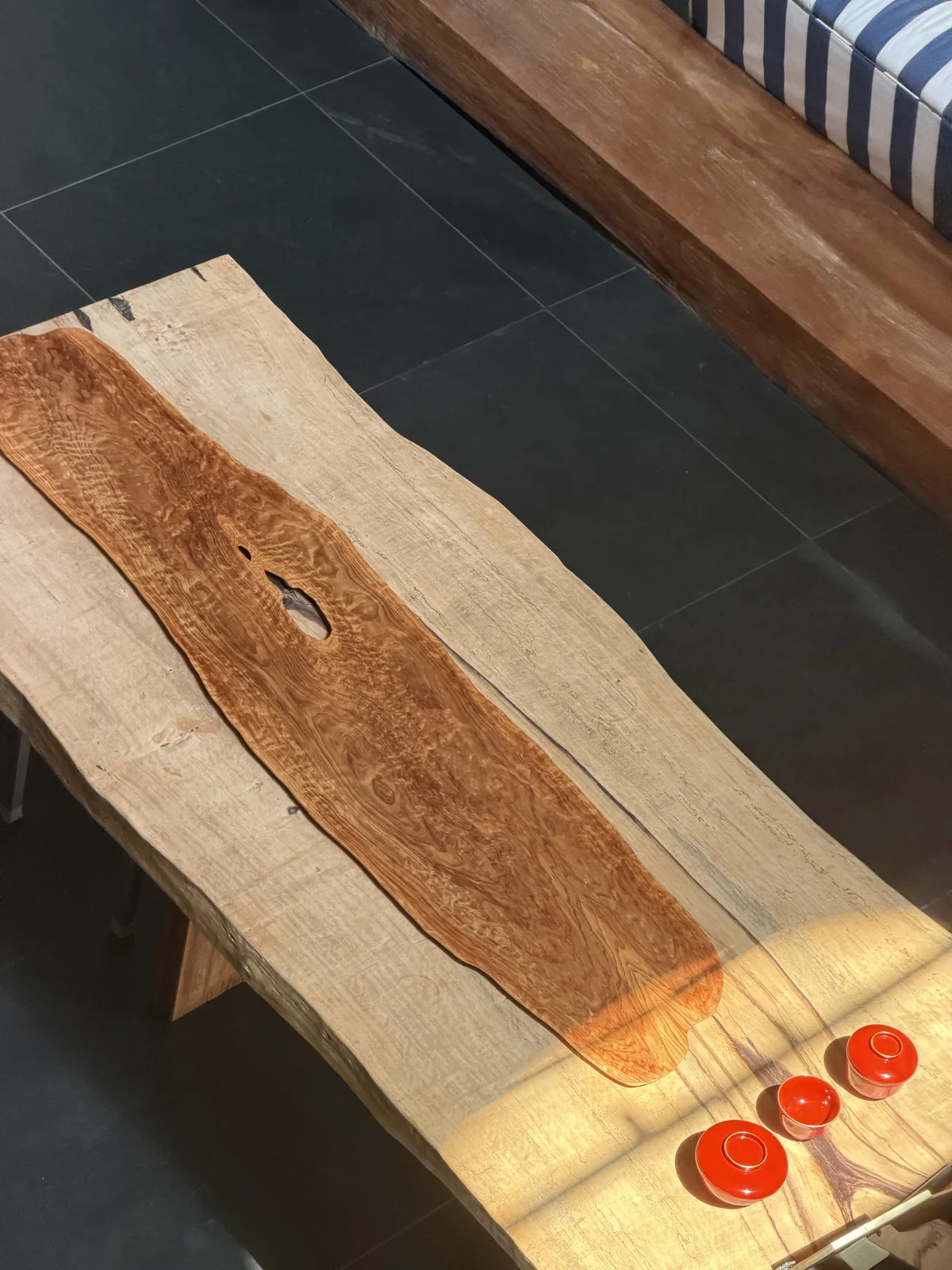 Live-edge solid timber slab table crafted by Takumi Singapore