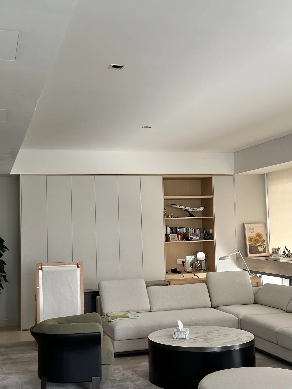 Full-height living room cabinet with a built-in display niche by a Singapore carpenter