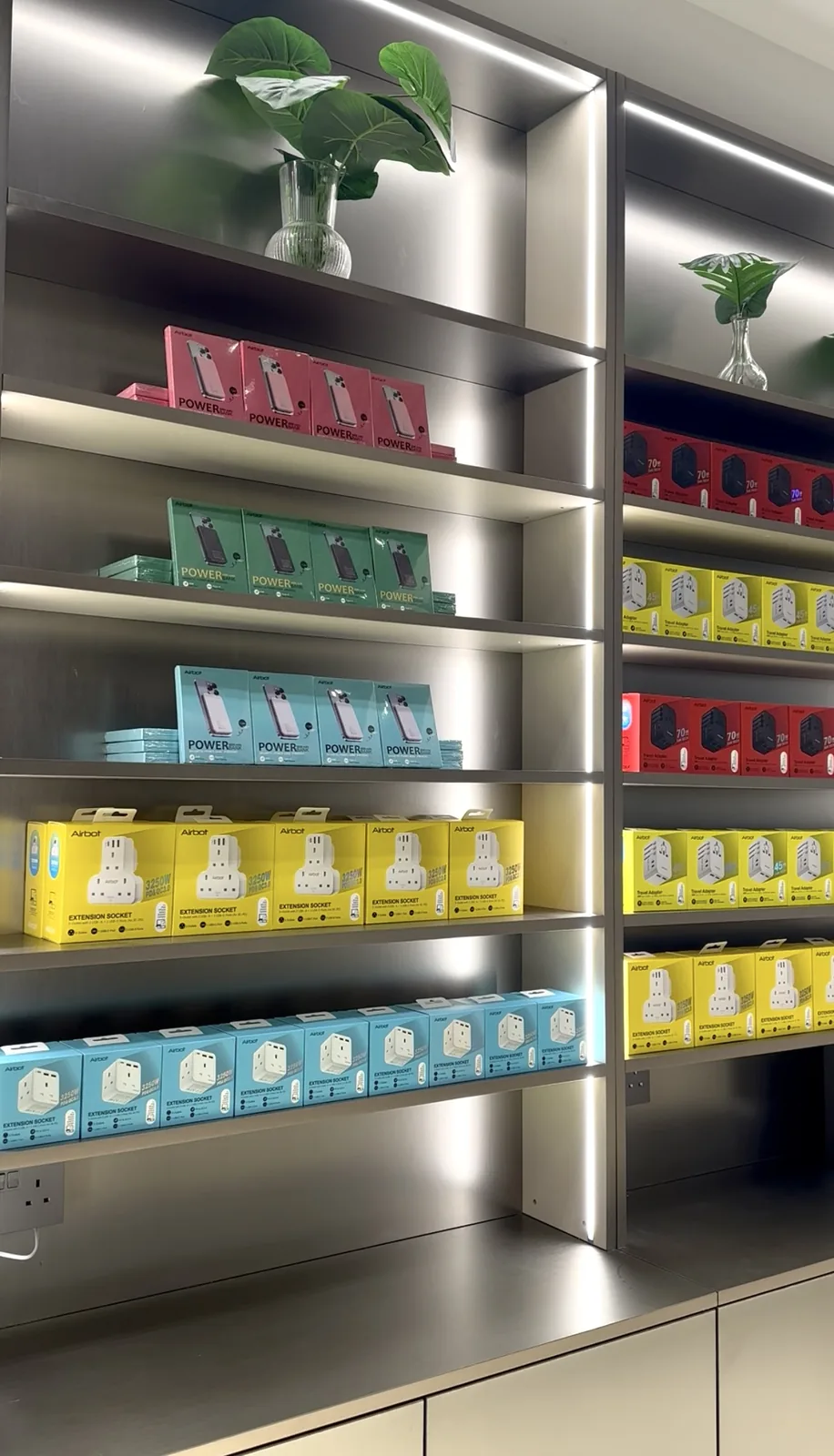 Backlit stainless retail display shelving fit-out by Takumi Singapore