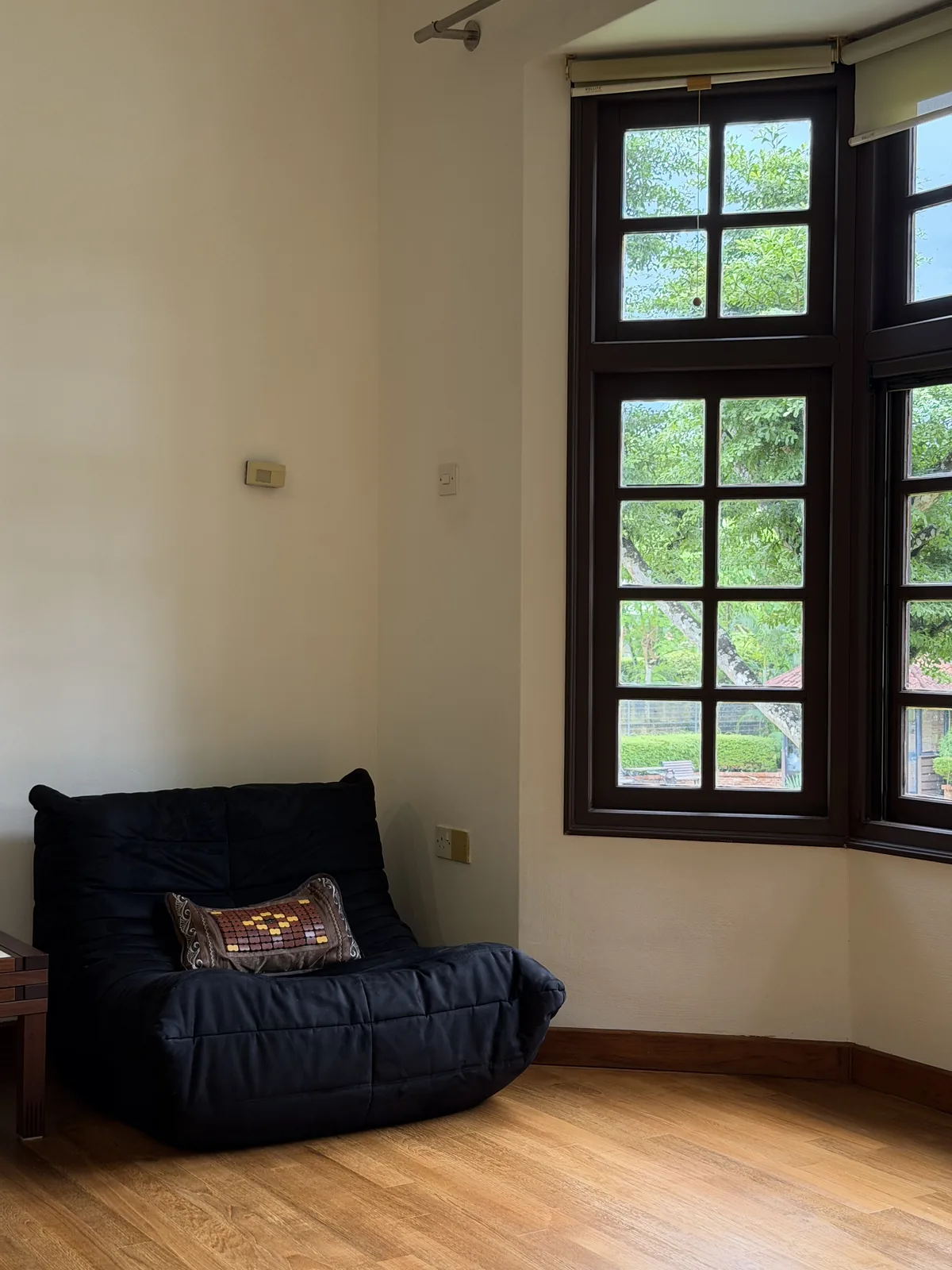 Timber bay window frame and oak flooring in a landed home, Singapore